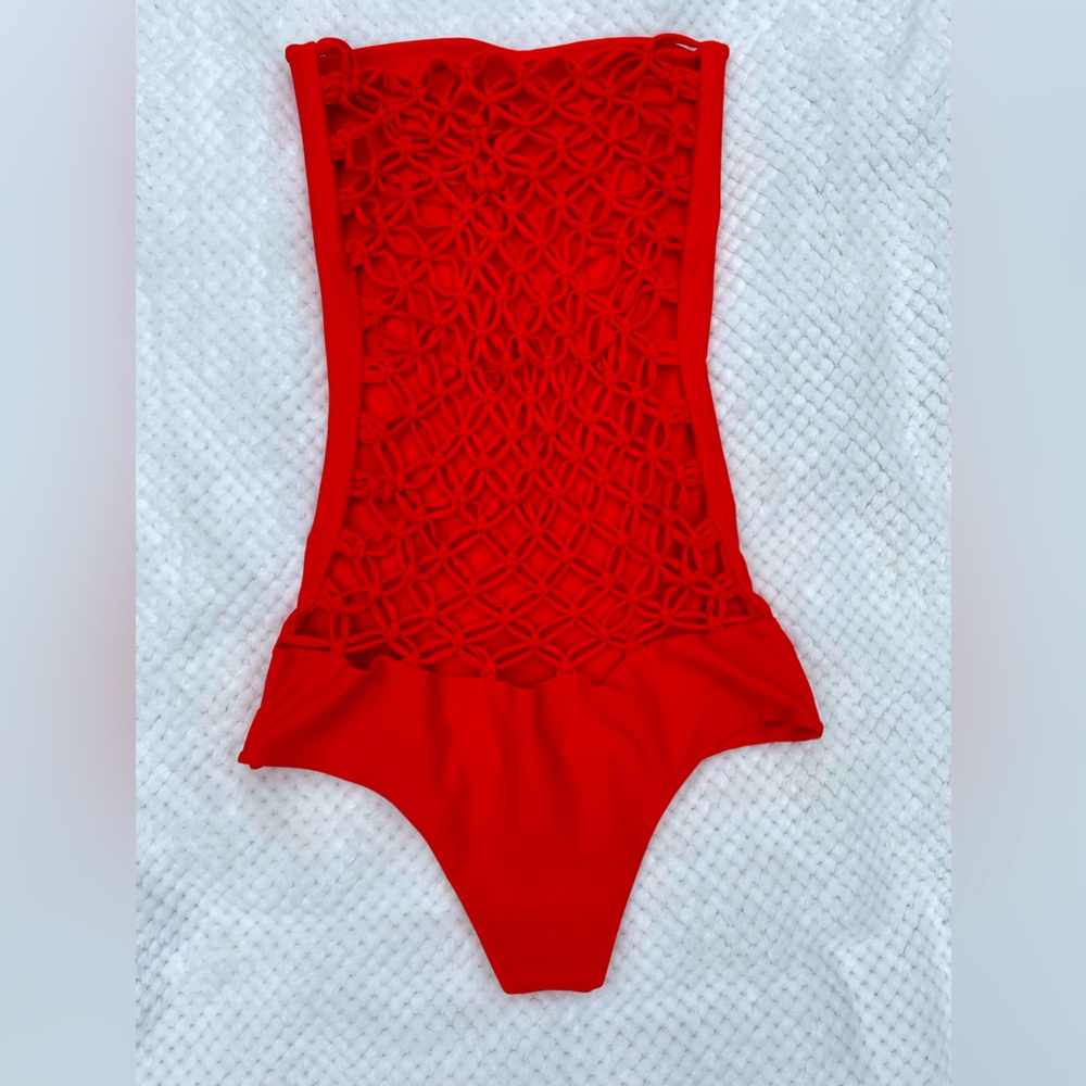 Like new MIKOH strapless one piece suit. Orange. Size medium. Crochet back.